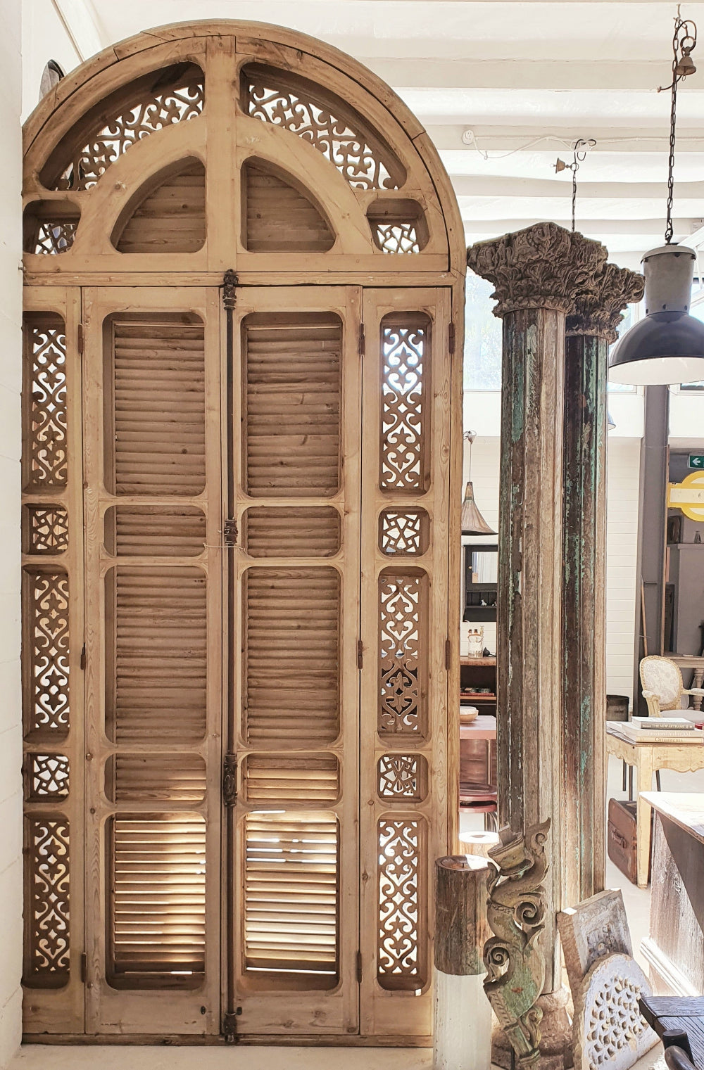 Wooden Moroccan doorset with shutters, stripped timber.