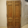 Carved antique entry doors, interior view.