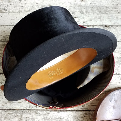 Silk Top Hat & Leather Luggage
