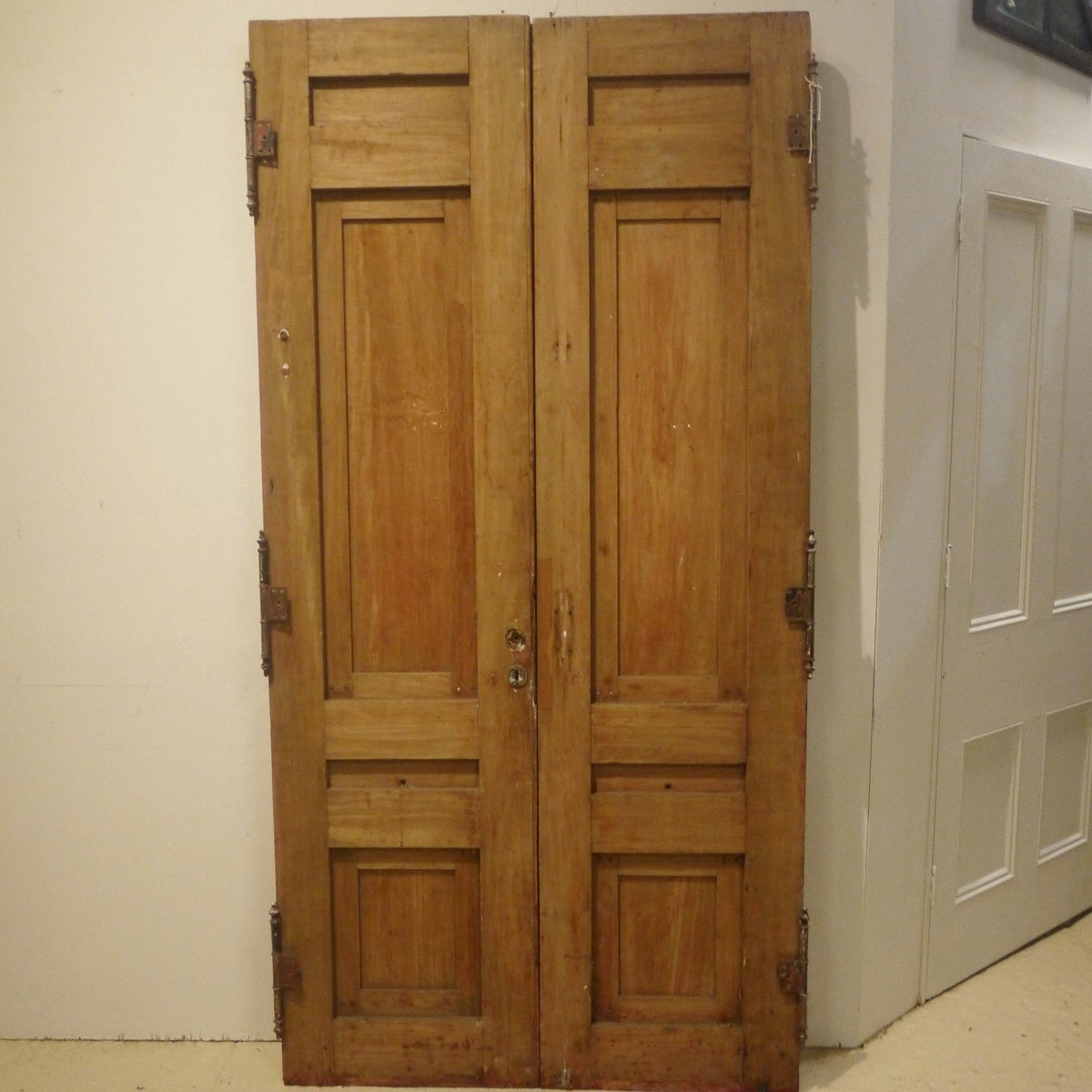 Carved antique entry doors, interior view.