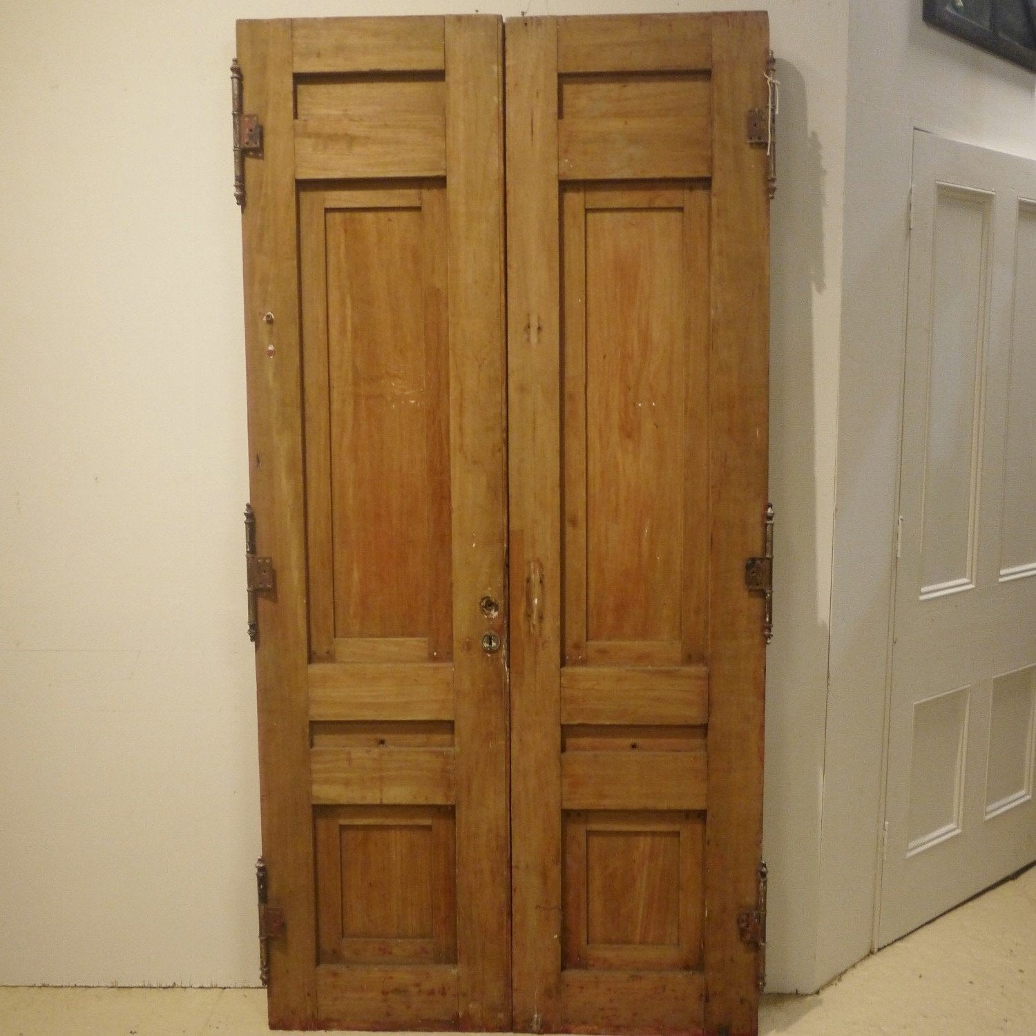Carved antique entry doors, interior view.