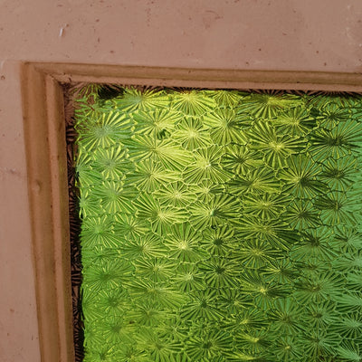 Green starburst pattern, salvaged glass